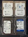 Lot Of (4) Seagate Western Digital 1TB Hard Drives ST31000524AS WD10EZEX. Fixed Price $50.00.