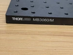 Two Metric Optical Breadboards: Thorlabs MB3060/M And Base Tools SAB30X30-M. Fixed Price $320.00.