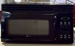 Maytag Over-the-range Black Metal Microwave Digital Display Timer. Fixed Price $150.00.