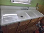 1950S Style Kitchen Farm Sink Double Basin With Drain Board. Fixed Price $600.00.